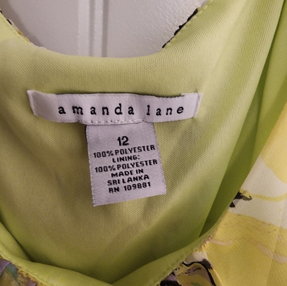 Women's Dress, 100% polyester, light green in color with elastic waste. - Picture 3 of 3